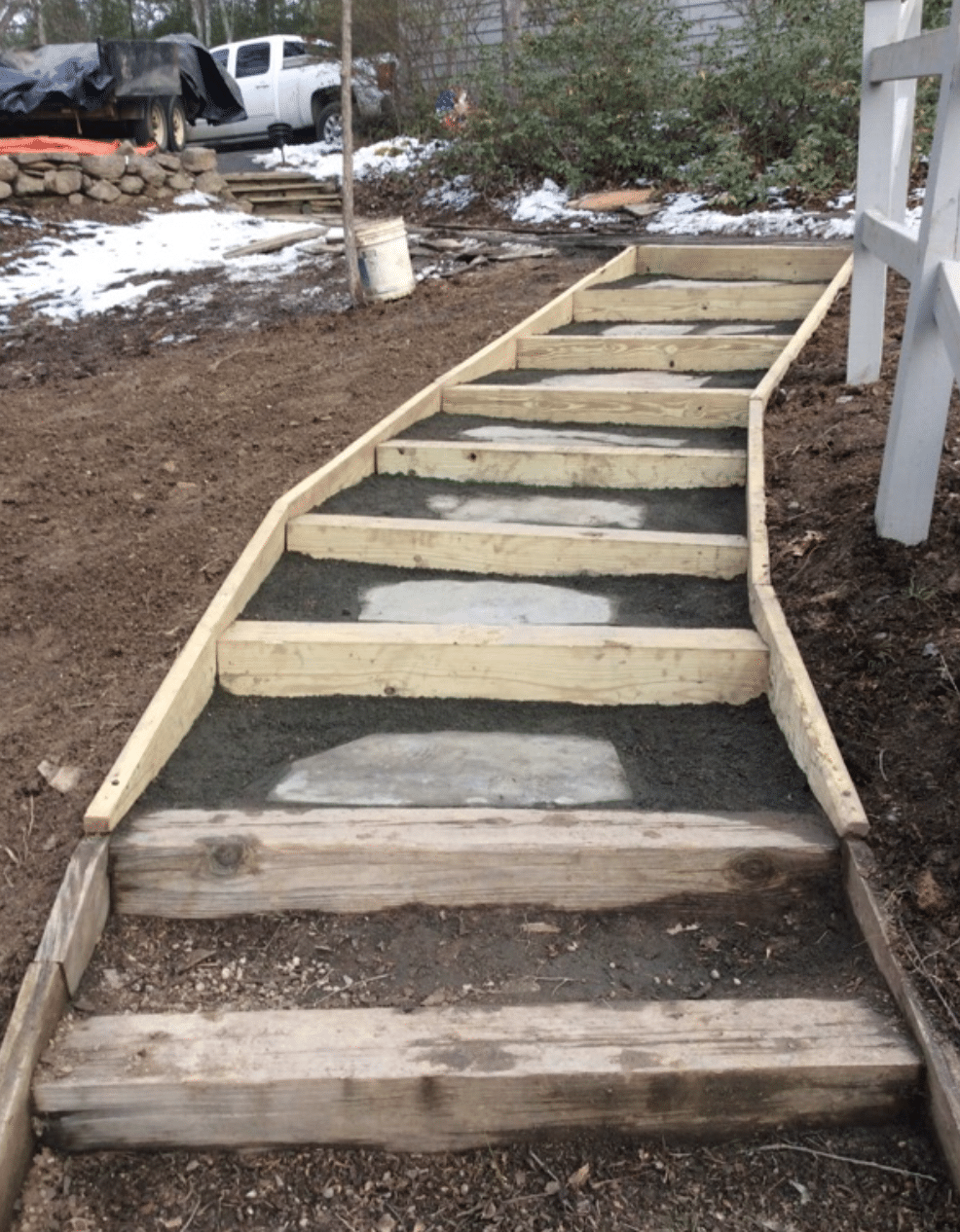 Wooden hardscaping steps with pavers